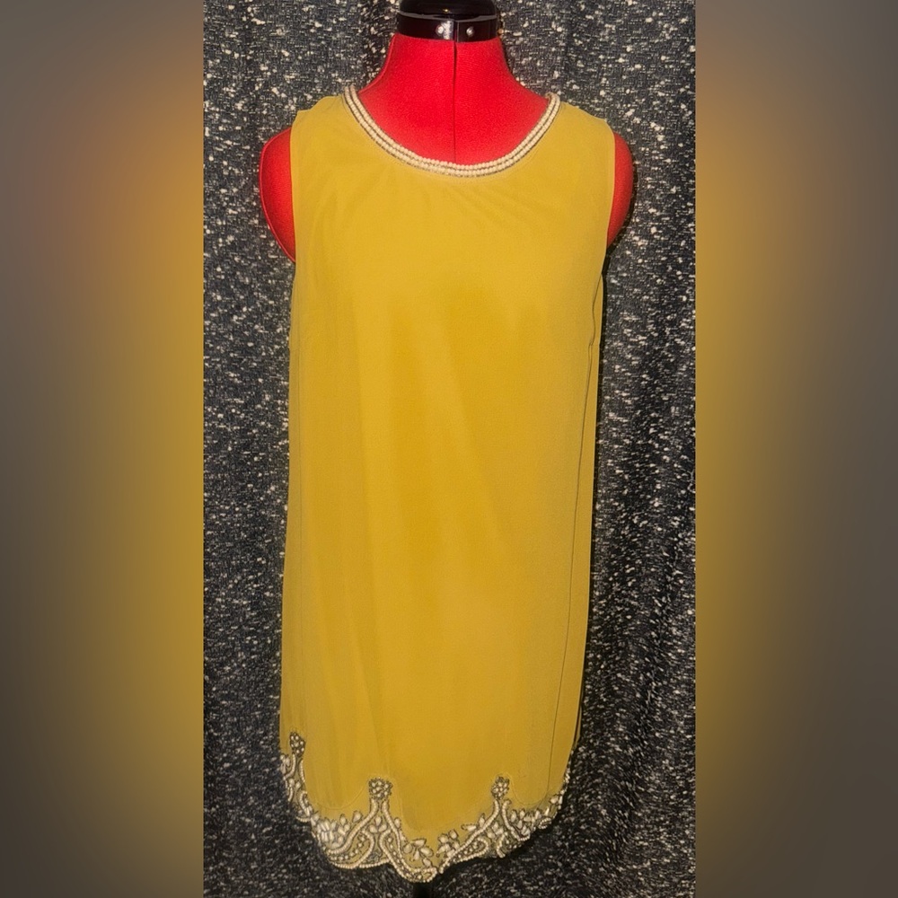 Karlie sleeveless dress with pearls around neck & bottom of dress